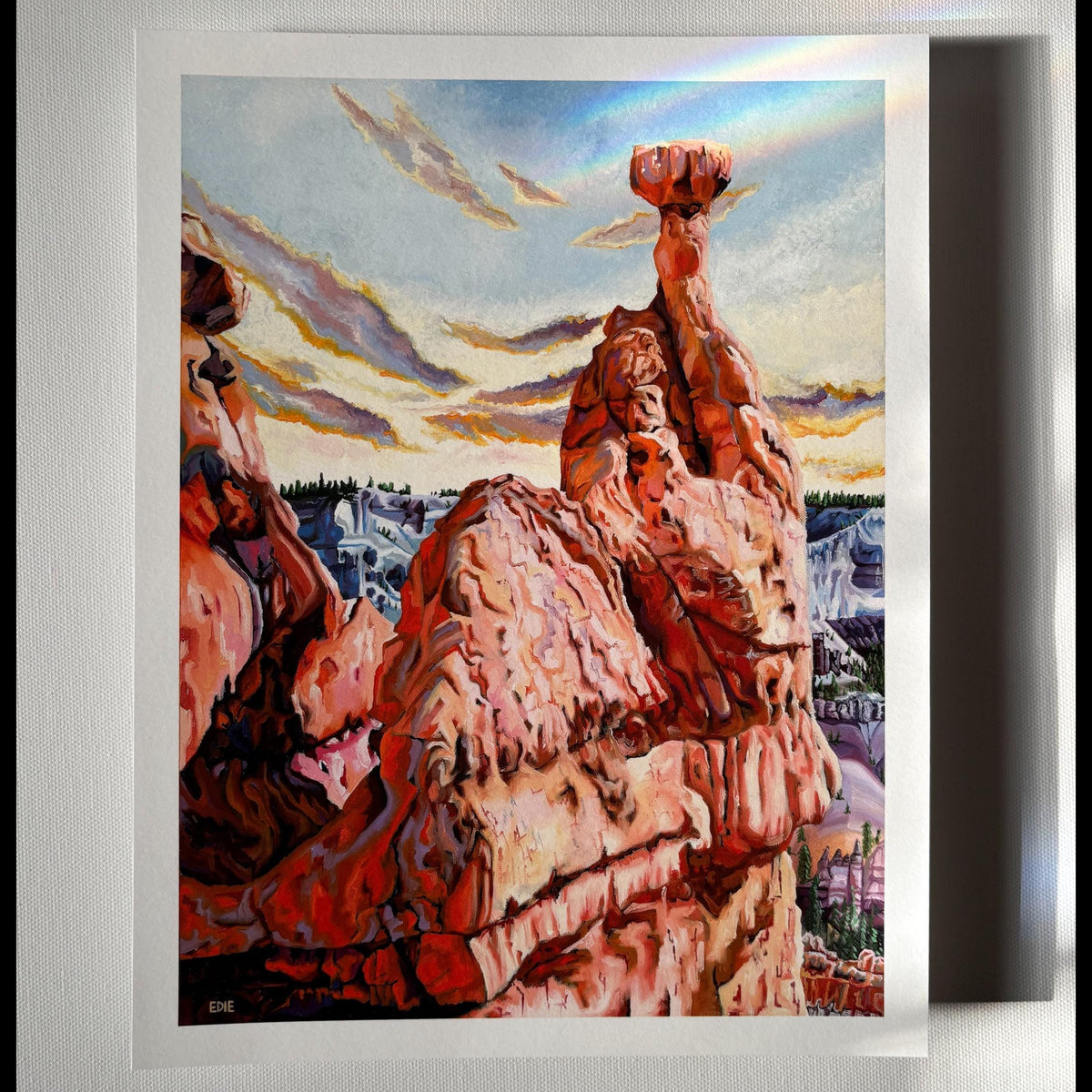 A vertical landscape art print depicting red rocks of Bryce Canyon.